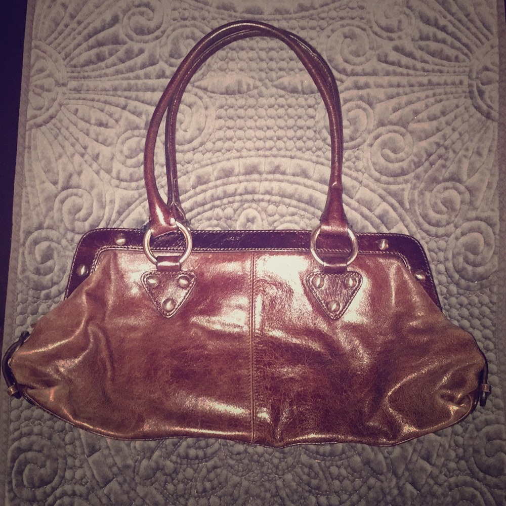 HOBO brown leather purse with silver grommets